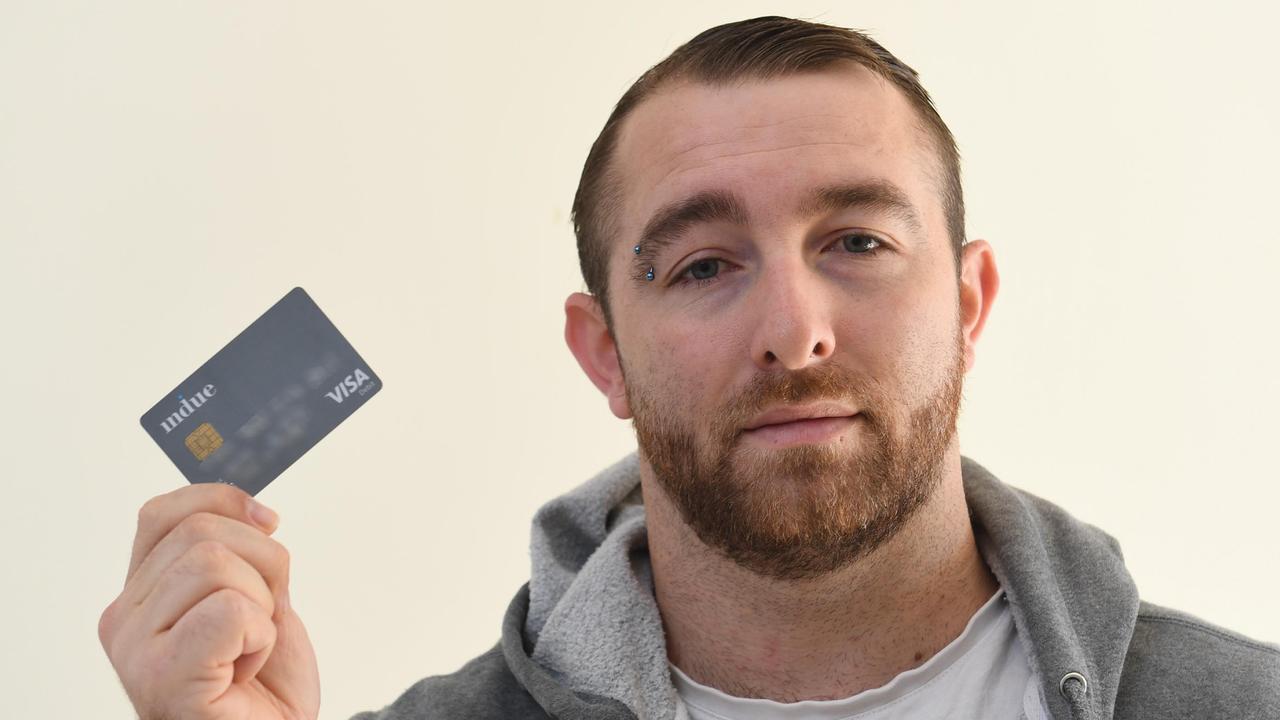Jake Dettmann with his Indue cashless welfare card.