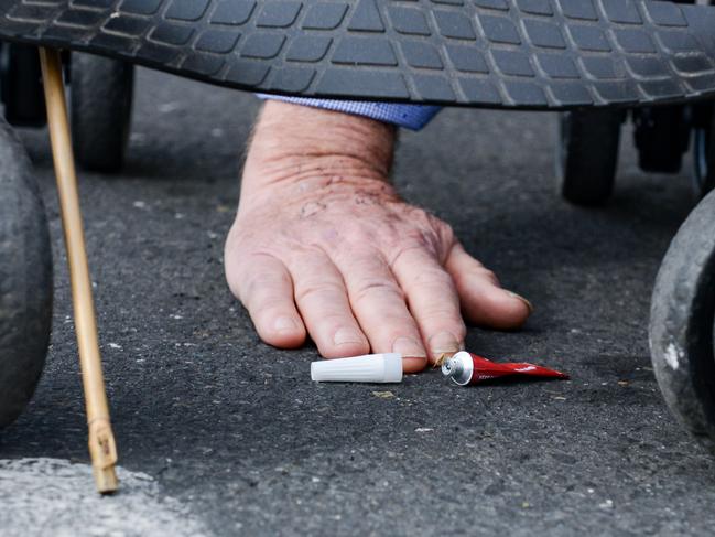 Protesters glued their hands or feet. Picture: NCA NewsWire/Brenton Edwards