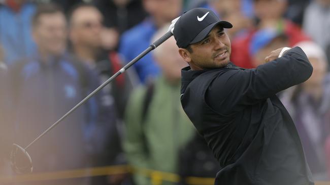 Australia's Jason Day struggles in a windy round two of the British Open.