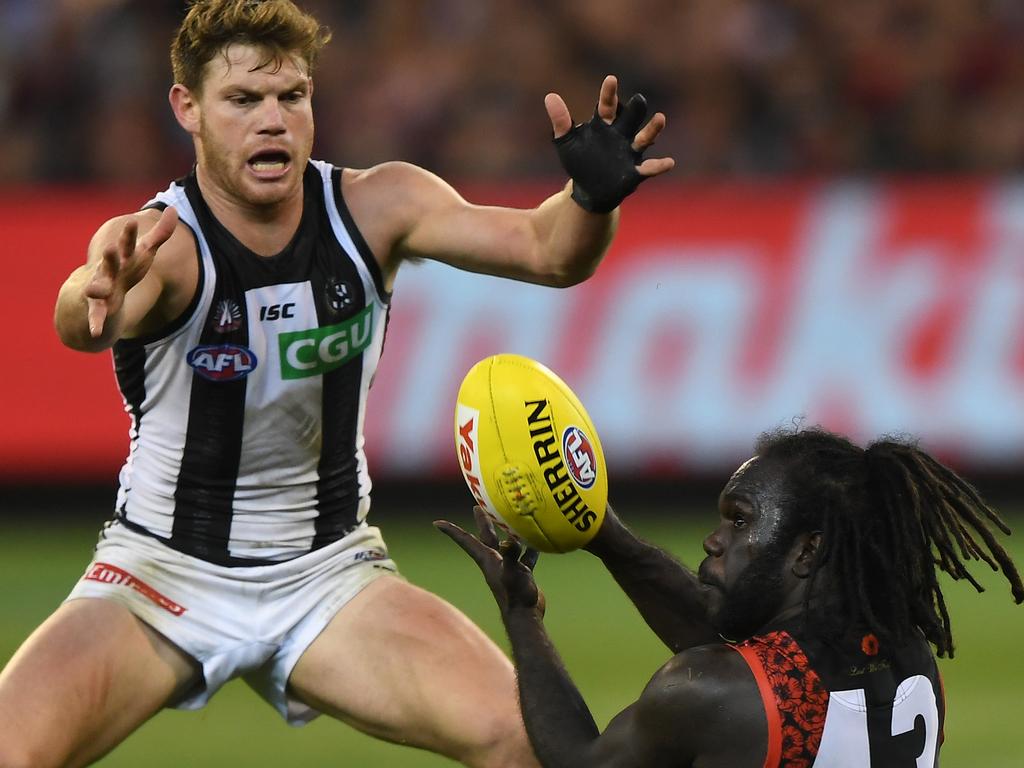 Anthony McDonald-Tipungwuti and Taylor Adams go head-to-head during last year’s Anzac Day game. Picture: AAP Images