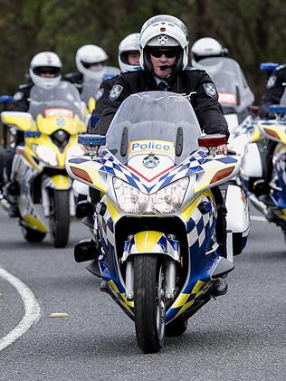 CMNEWS_Queensland Motorcycle police officers pictured here on Mount Coot-Tha today Monday August 4th, 2014. Pictures: Jack Tran / The Courier Mail