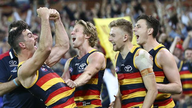 Taylor Walker, Rory Sloane, Hugh Greenwood and Jake Lever celebrate on the siren. Picture: Sarah Reed.