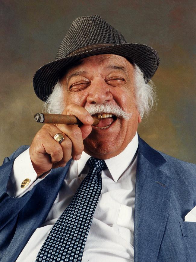 SA businessman Constantine (Con) Polites smoking cigar 14 Jan 1995.