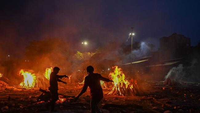 Close to 200 journalists have died in the act of documenting this second wave, filming in overcrowded wards, counting funeral pyres. Picture: AFP