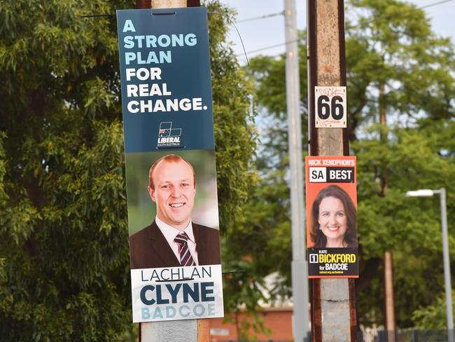 Election posters photographed on stobie poles in Adelaide on Friday the 16th of March 2018. (AAP/ Keryn Stevens)