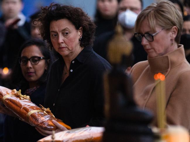 Vigil for Thai childcare massacre held at fed square. MP Zoe Daniel, MP Monique Ryan and former mp Derryn Hinch. Picture: Jason Edwards