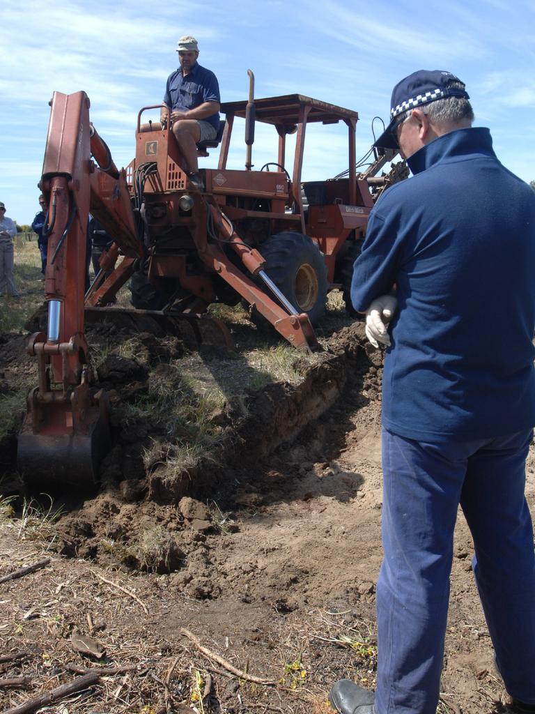 SA Police officers using excavator during investigation of property searching for remains of missing person Giuseppe Iannella in 2006. Picture: Supplied