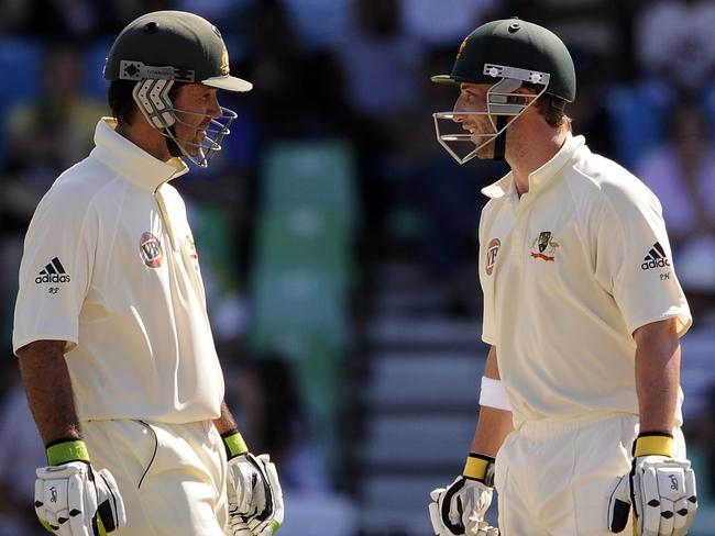 ‘I love it’: Ricky Ponting and Phillip Hughes share a smile batting against South Africa at Kingsmead Stadium.