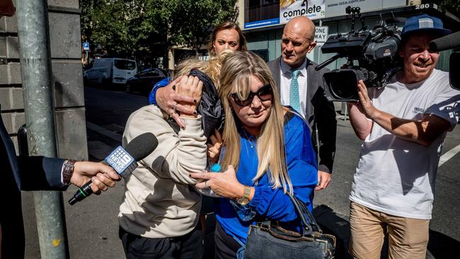 Kayla Potts is escorted from the Melbourne Magistrates' Court by her mother. Picture: Jake Nowakowski