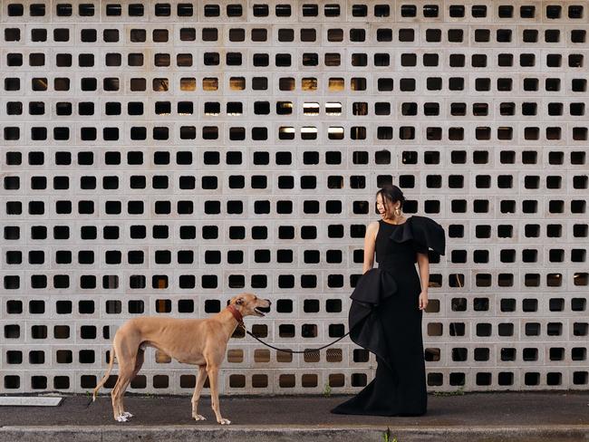 Yvonne from Melbourne, with her greyhound Ronnie. Picture: @ronnie_mcmeng/Instagram