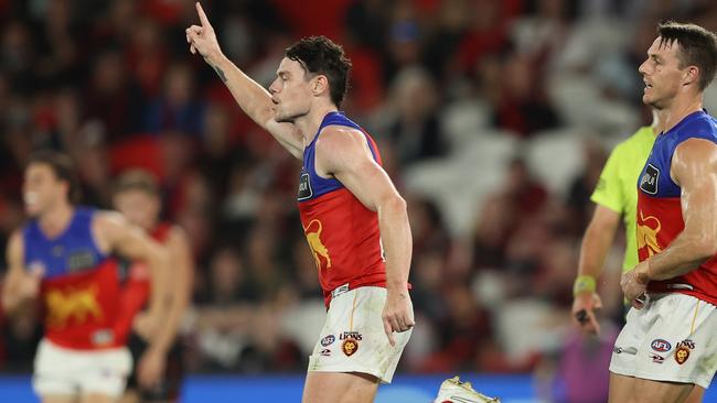 Lachie Neale celebrates after kicking a goal against the Bombers. Picture: AFL Photos/via Getty Images