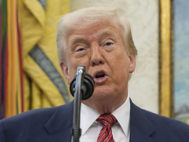President Donald Trump speaks before David Perdue is sworn in as U.S. Ambassador to China during a ceremony in the Oval Office of the White House, Wednesday, May 7, 2025, in Washington. (AP Photo/Mark Schiefelbein)