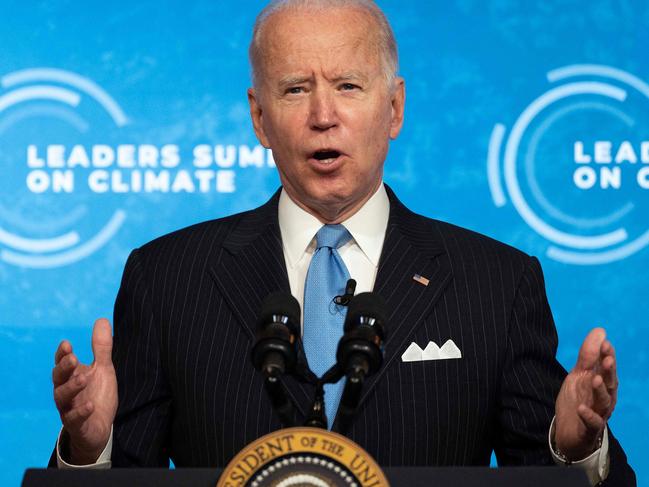 (FILES) In this file photo taken on April 23, 2021 US President Joe Biden delivers remarks and participates in the virtual Leaders Summit on Climate Session 5: The Economic Opportunities of Climate Action from the White House in Washington, DC. - President Joe Biden has hit some big targets in 100 days, starting with an epic effort to pull the United States from its Covid-19 nightmare, but headaches lie ahead. (Photo by JIM WATSON / AFP)