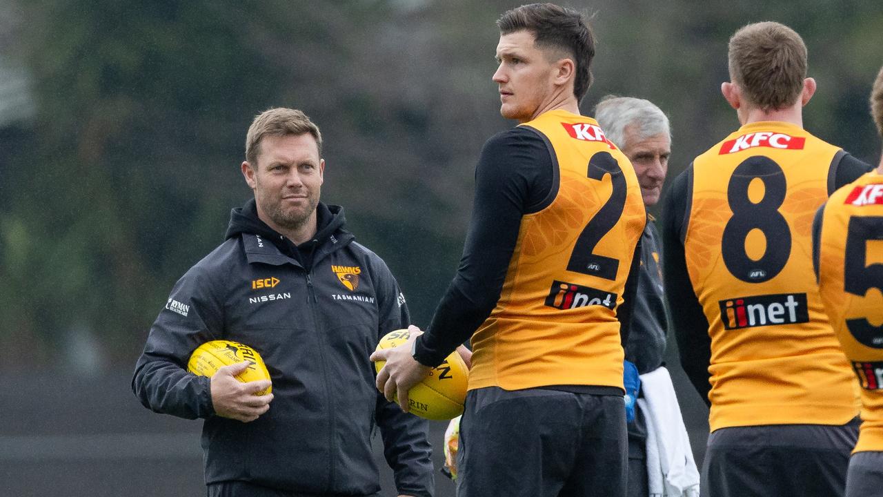 Hawthorn coach Sam Mitchell (left) says the Hawks are ‘proud’ of Mitch Lewis’ response to a season-ending knee injury after already missing three months of football. Picture: Jason Edwards