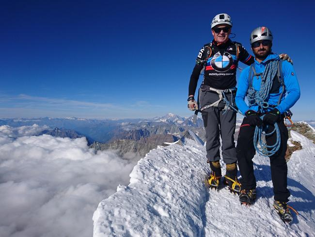 Pat Farmer, left, with Swiss mountaineer Guy May on the summit of the Matterhorn. He realised his dream of climbing the mountain last August.