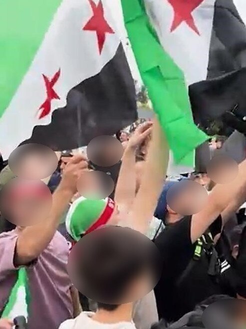 People celebrating the demise if Assad in Syria.