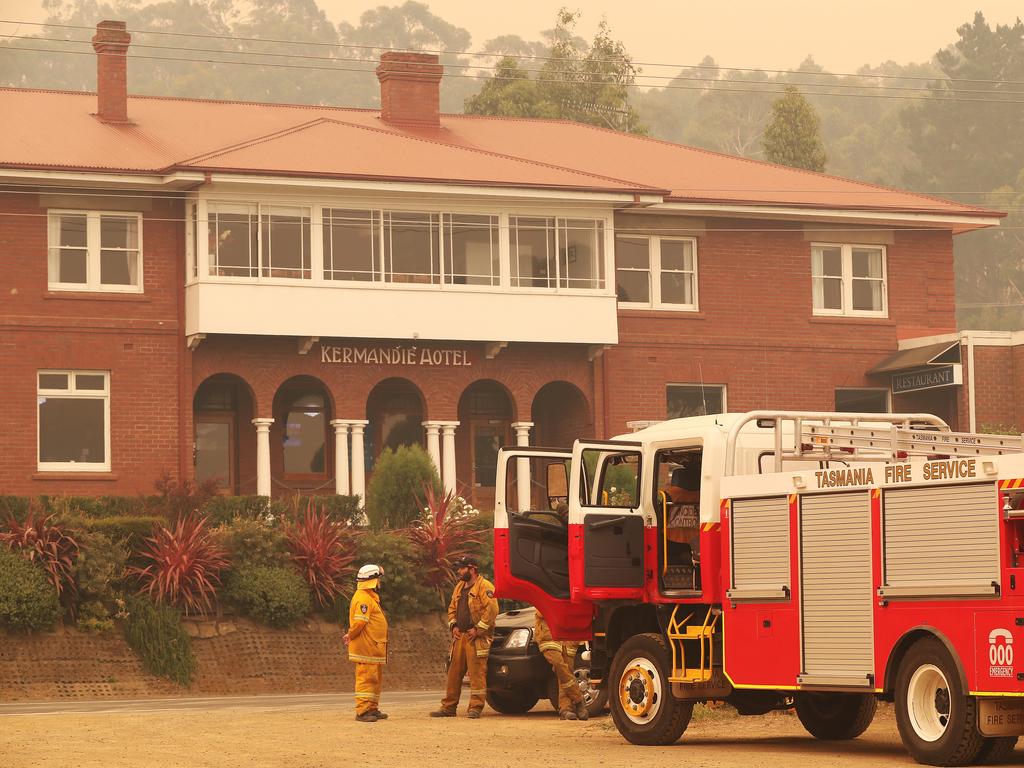 January 2019 Tasmanian Bushfires. Firefighters near the Kermanie Hotel at Port Huon. Picture: NIKKI DAVIS-JONES