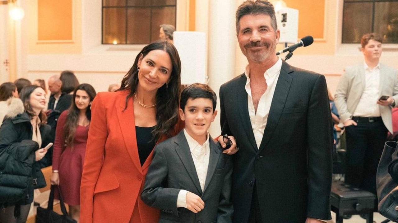 Cowell smiled with son Eric, 8, and fiancee Lauren Silverman. Picture: Instagram.