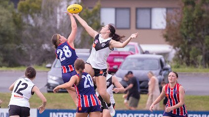 A ruck contest between the Southport and Grange girls.