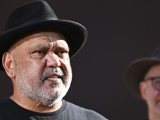 ULURU, AUSTRALIA, NewsWire Photos. OCTOBER 11, 2023: Noel Pearson waits for Pat Farmer as he finishes his run around the country to raise awareness about the Yes campaign in Uluru. Picture: NCA NewsWire / Martin Ollman