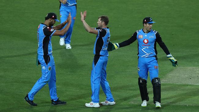 Ben Laughlin of the Adelaide Strikers celebrates the wicket of Matthew Wade. Picture: GETTY