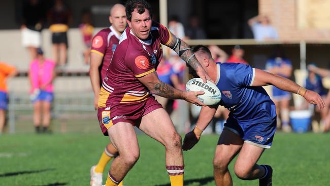 Sharks prop forward Josh Starling looks to offload. Picture: Steve Montgomery Sports Photography