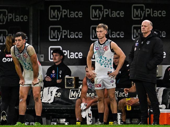 Zak Butters, Joe Richards and Ken Hinkley look on as the Dockers take control of the game. Picture: Daniel Carson/AFL Photos