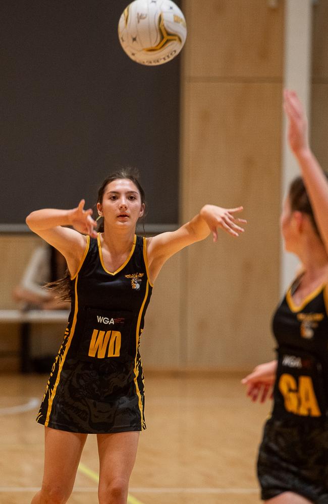 Northern Districts Eagles against Tigers Gold in the 2023 Darwin Netball under-17 Div 2 grand final. Picture: Pema Tamang Pakhrin