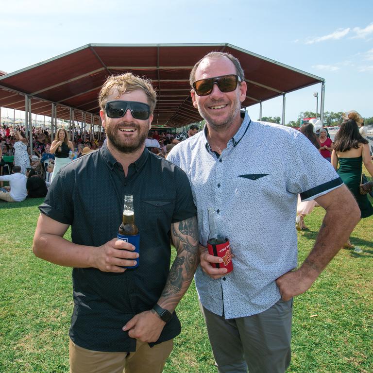 Dean Zahra (L) and Ben Wauhop as punters enjoy the 2020 Great Northern Darwin Cup. Picture: GLENN CAMPBELL