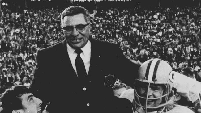 Green Bay Packers coach Vince Lombardi is carried off the field after winning Super Bowl II.