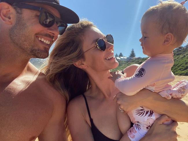 Jennifer Hawkins and her husband Jake with their daughter Frankie.