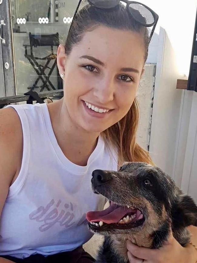 Constable Rachel McCrow with her dog. Picture: Facebook / The Queensland Police Union of Employees