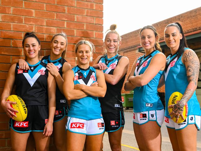 Justine Mules, left, pictured with new teammates Hannah Dunn, Kate Surman, Erin Phillips, Indy Tahau and Gemma Houghton. Picture: Morgan Sette