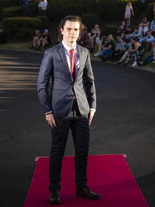 Rylan Wilson arrives at Harristown State High School formal at Highfields Cultural Centre, Friday, November 18, 2022. Picture: Kevin Farmer