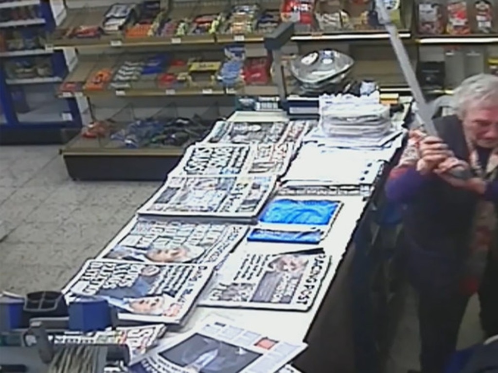 Surveillance video show June Turner, 83, fighting off a robbery suspect with her cane. Turner was the winner of the Amplifon Awards for Brave Britons in the Act of Courage category.