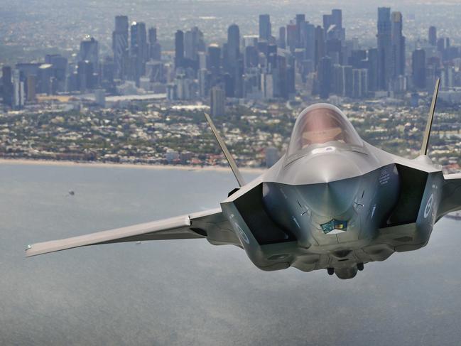 2023 Air Show Australian International Airshow. Royal Australian Air Force C-17A Globemaster aircraft, tailed by a RAAF F-35 fighter jet to celebrate the 2023 Australian International Airshow. An RAAF F-35 pilot flies his fighter jet over the Port Phillip Bay and Melbourne CBD. Picture: David Caird