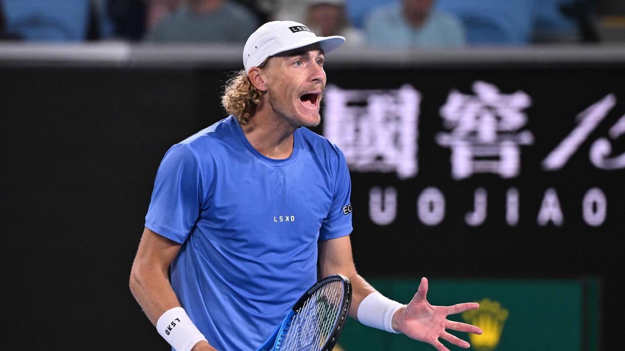 Australia's Max Purcell reacts during his clash with Casper Ruud. (Photo by WILLIAM WEST / AFP)