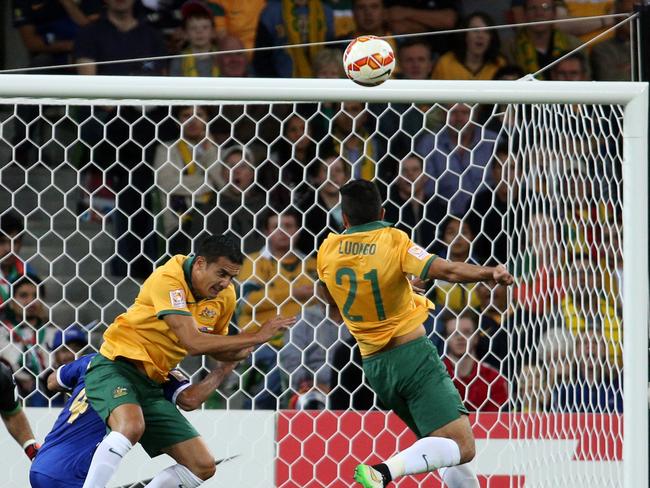 Massimo Luongo beats Tim Cahill to the ball and sends his header into the back of the net.