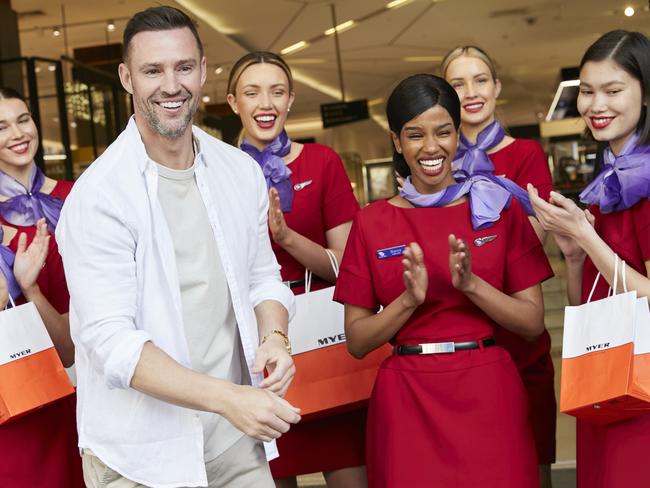 Myer ambassador Kris Smith and Virgin staff celebrate a new deal by which Velocity members will be able to use their points to purchase products through myer.com.au. Picture: Carly Ravenhall