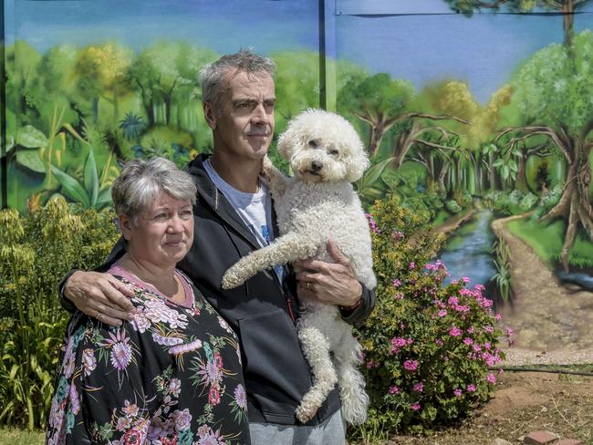 Unhappy residents John, Sharon and dog Odie. Picture: Roy VanDerVegt