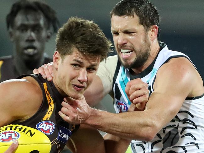 AFL - Saturday, 22nd August, 2020 - Port Adelaide v Hawthorn - Indigenous Round at the Adelaide Oval. Hawthorn's Daniel Howe  under pressure from Port's Travis Boak Picture: Sarah Reed