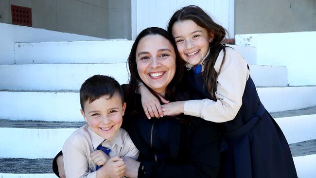 Lisa Maletta with Sebastian, 6, and Olivia, 8, at St Fiacre Catholic Primary School yesterday. Picture: Hollie Adams