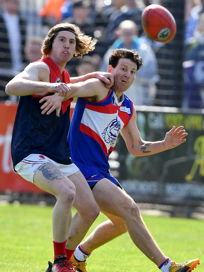 Ty Franks tangles with Shane Harvey during the NFL Division 2 grand final. Picture: Andy Brownbill.