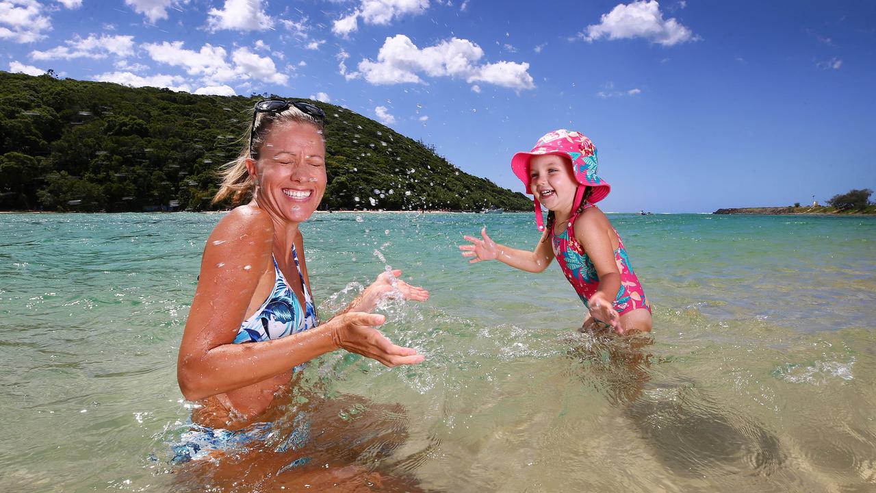 Kristin Sutton and daughter Layla Sutton, 3, enjoy the beautiful Tallebudgera Creek as Queensland braces for a bumper Easter. Picture: Adam Head.