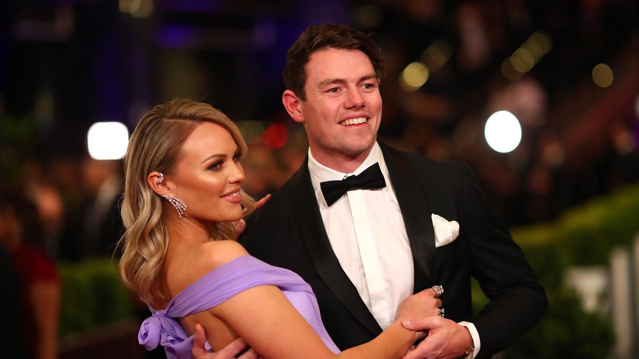 Lachie Neale of the Lions and wife Julie arrive at the Brownlow.