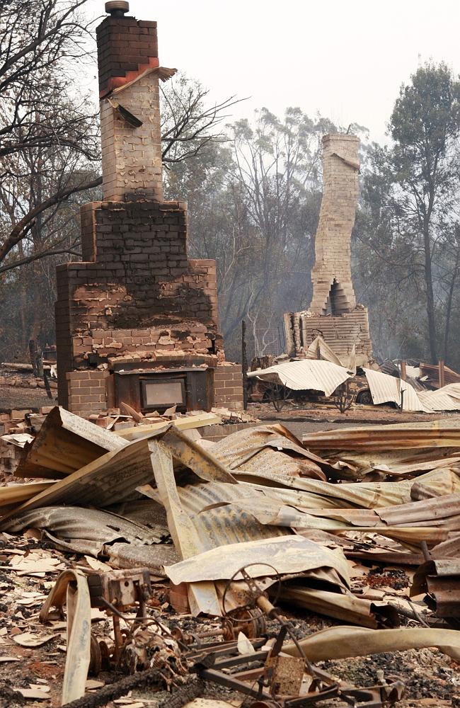 Horrific ... A chimney stands where a house stood in Marysville, Victoria, before the Black Saturday bushfire on 7 February 2009.