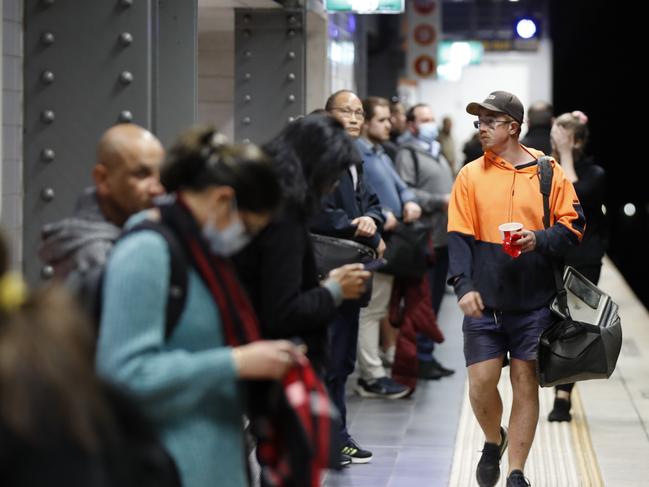 DAILY TELEGRAPH AUGUST 31, 2022. Commuters at the start of the peak hour rush at Town Hall Station in Sydney during another train strike. Picture: Jonathan Ng