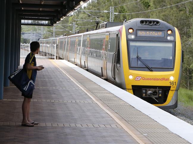 Commuters at the Helensvale Train station. Picture: JERAD WILLIAMS