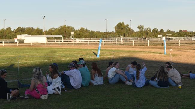 Spectators cheer on as they watch the A Grade Roma vs Condamine match at the Roma Rugby Races at Bassett Park. Picture: Chloe Cufflin.