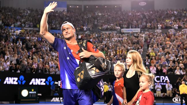 Lleyton leaves Rod Laver Arena followed by Cruz, Mia and Ava after being defeated at the Australian Open in 2016. Picture: Julian Smith